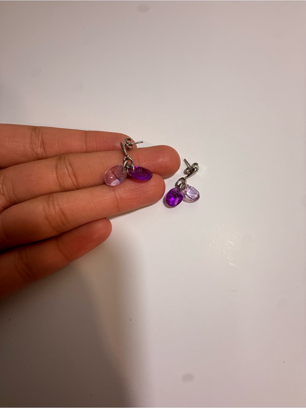 Silver Toned Dangle Earrings With Purple Beads